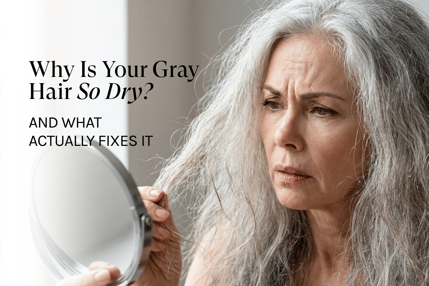 a woman looking in the mirror with dry gray hair