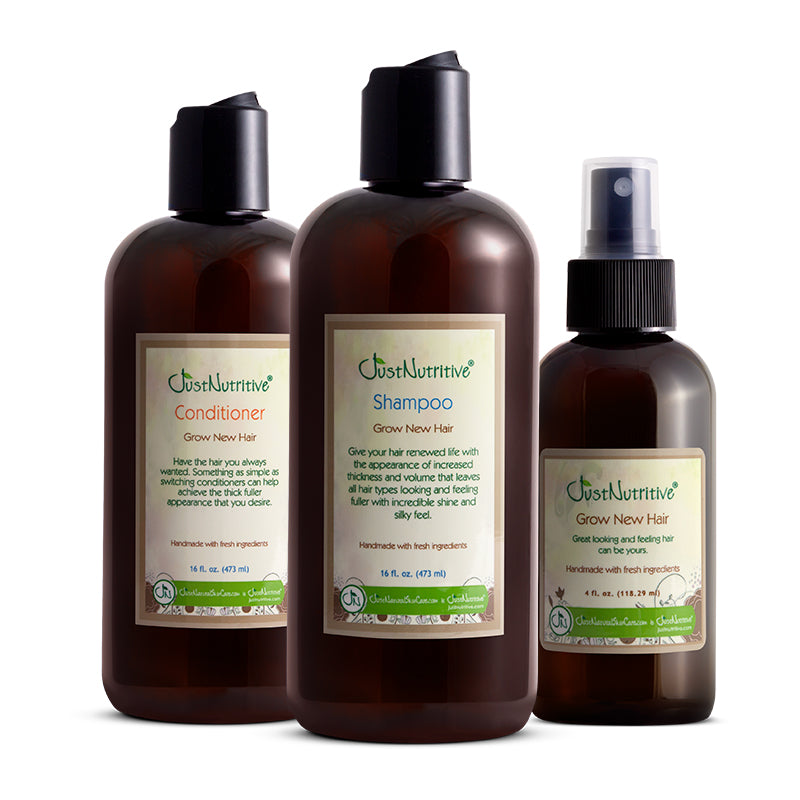 Three bottles of Just Nutritive hair care products on a white background