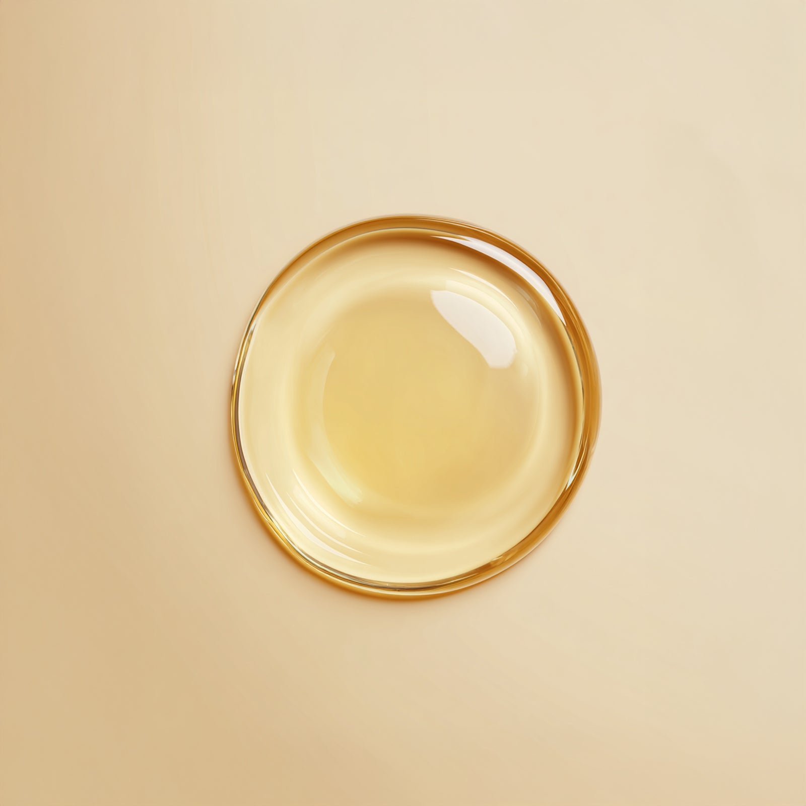 Clear gel-like substance in a round container on a beige background