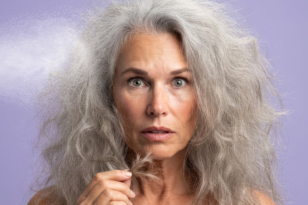 Middle age woman with silky, soft, healthy gray hair