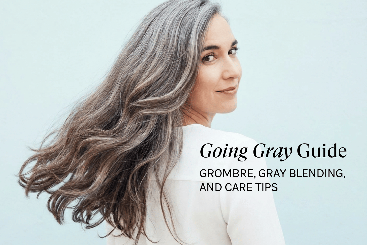 a woman hair blowing in the air with beautiful gray hair