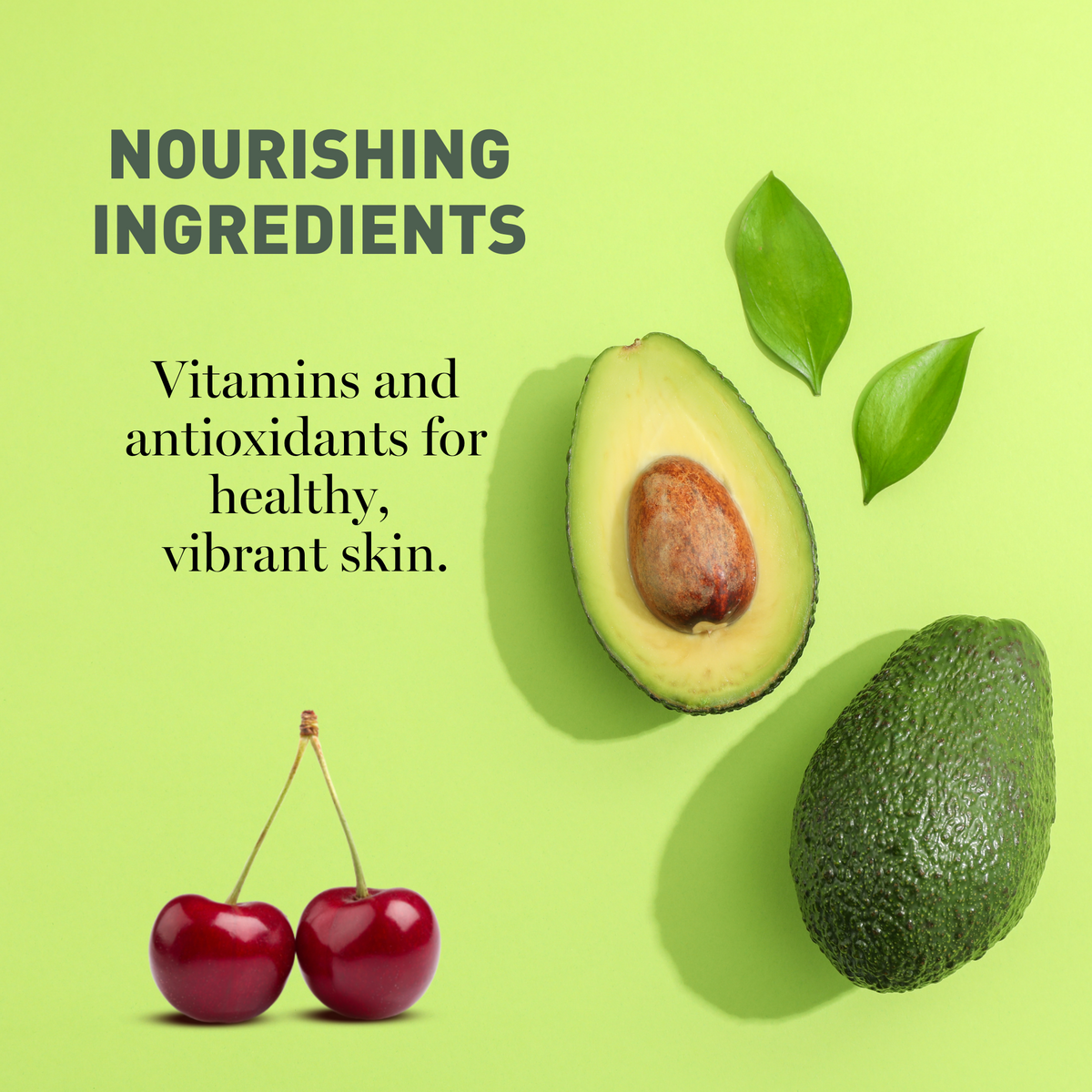 Avocado, cherries, and leaves on a green background with text about nourishing ingredients.