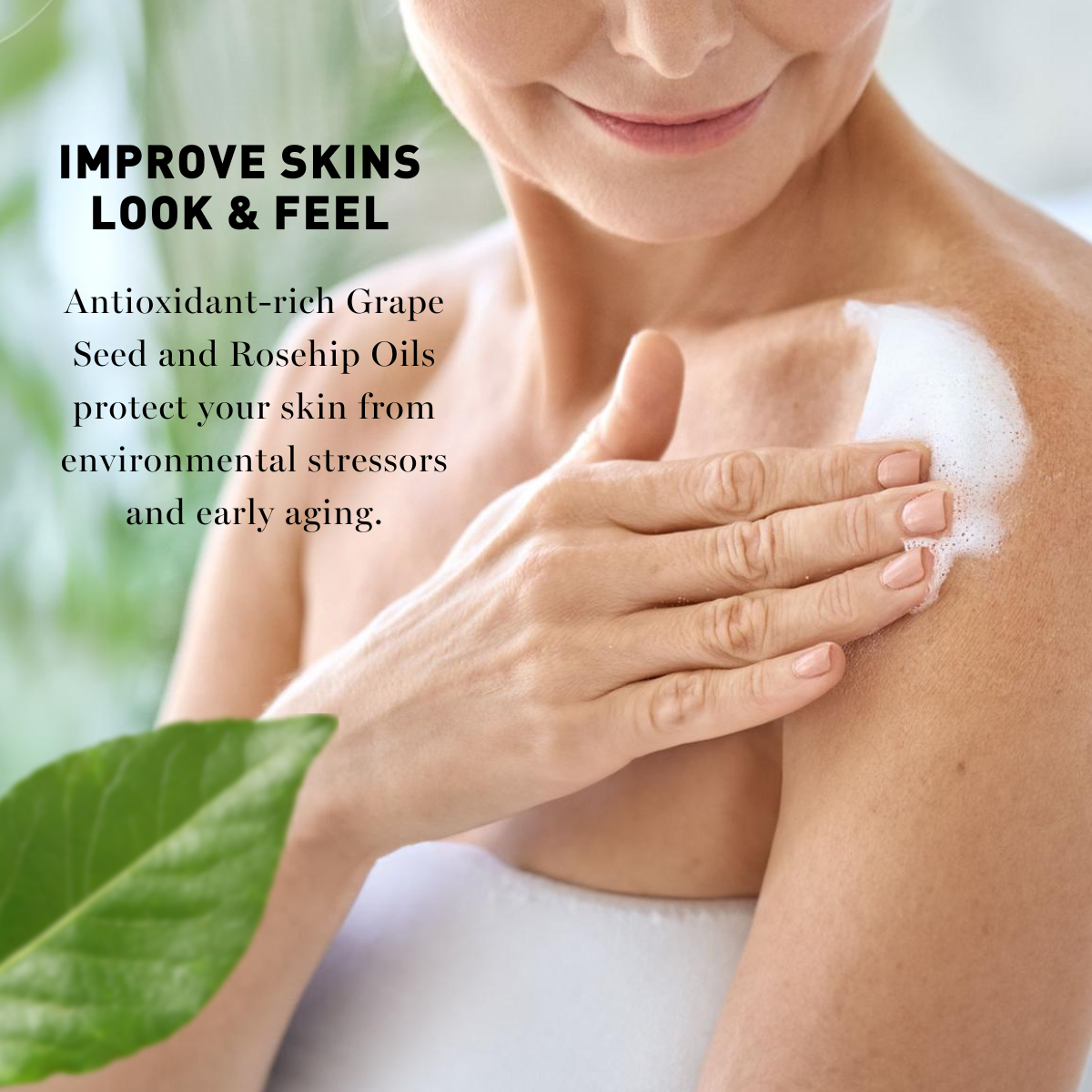 Woman applying a skincare product to her shoulder with text about antioxidant-rich grape seed and rosehip oils.