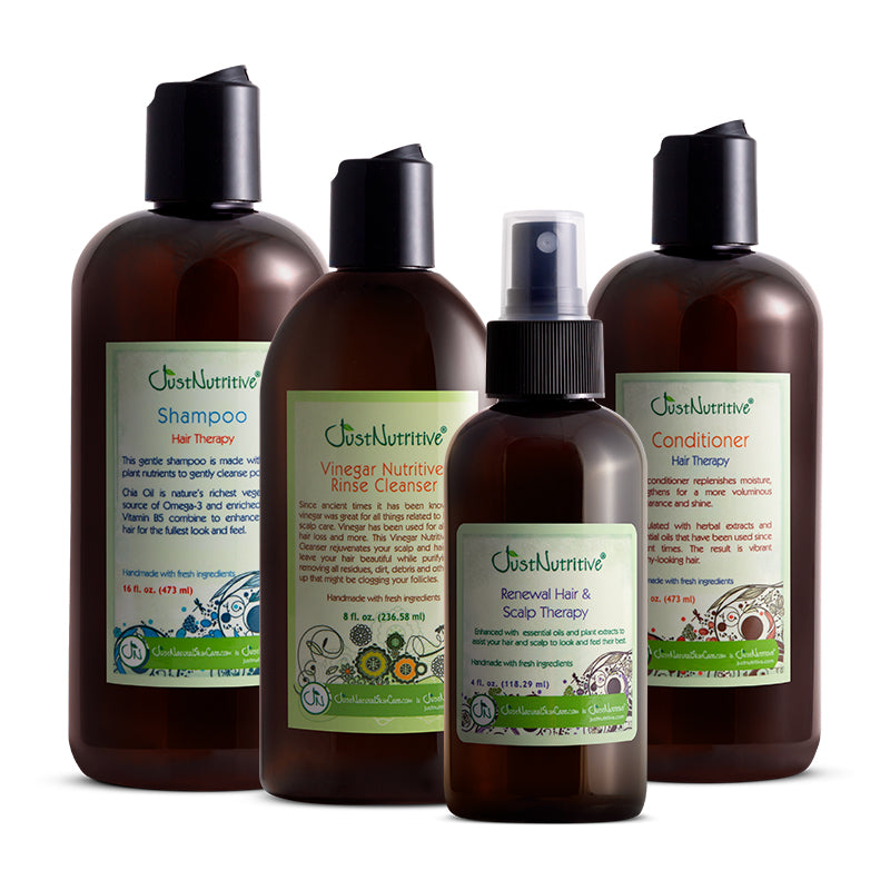Set of Just Nutritive hair care products including shampoo, conditioner, treatment, and rinse cleanser on a white background.
