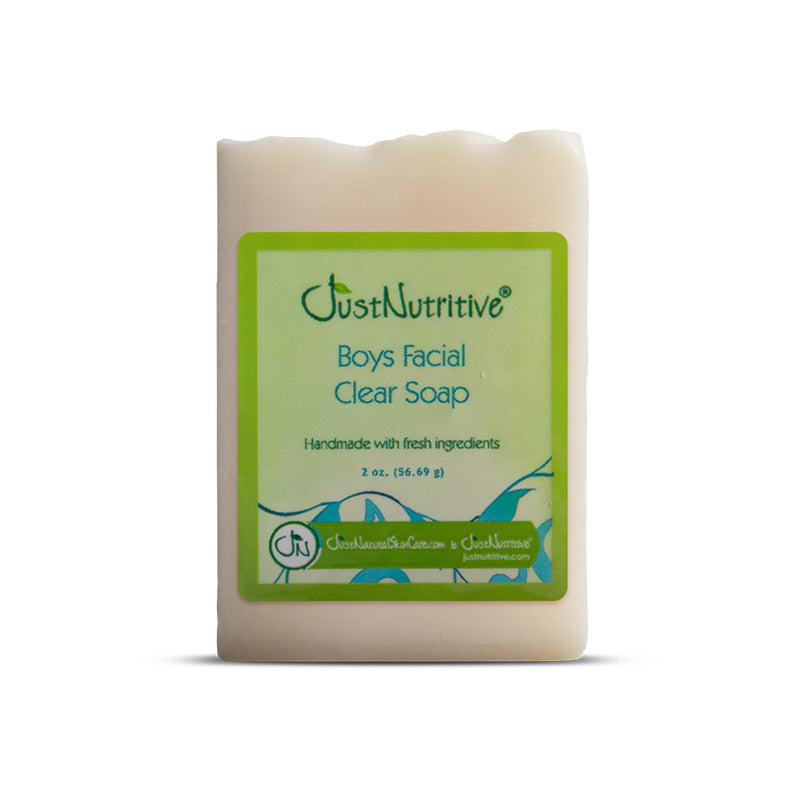 Bar of soap with a green label on a white background