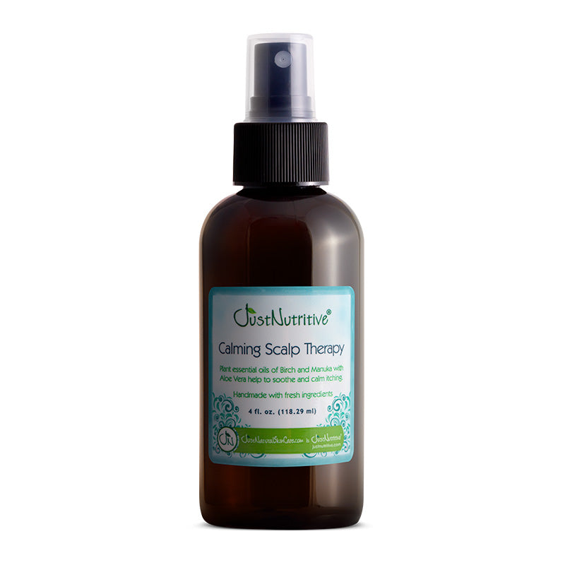 Bottle of Calming Scalp Therapy with a label on a white background