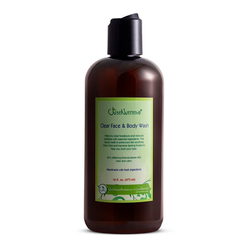 Brown bottle of Clear Face & Body Wash with a green label on a white background
