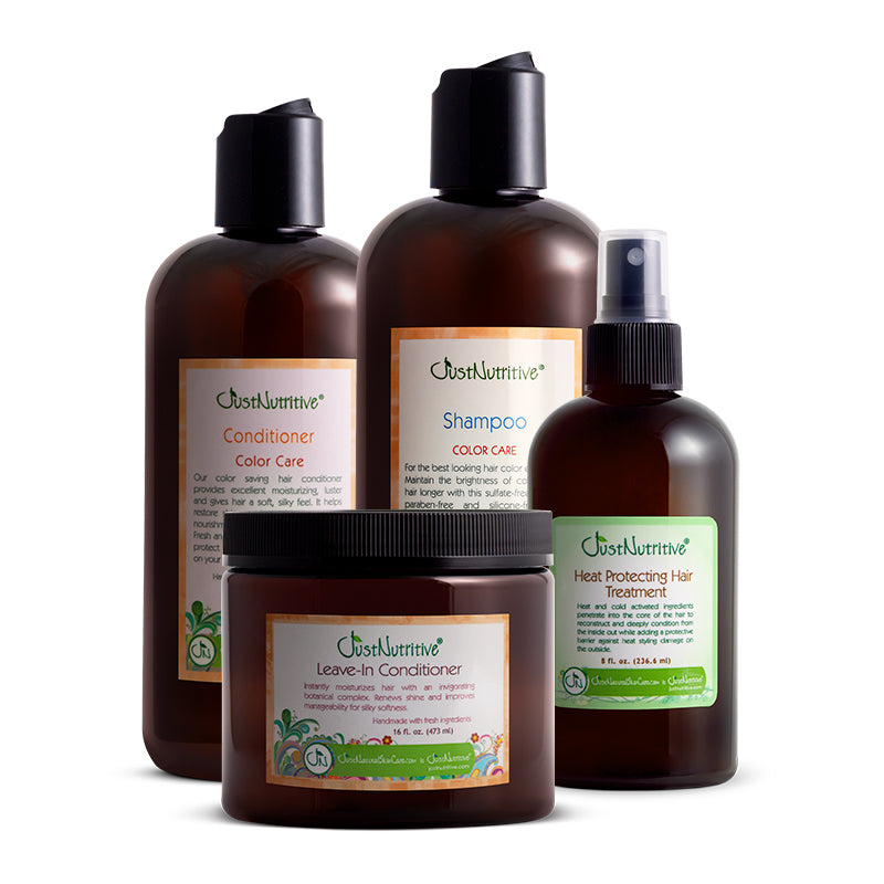 Set of hair care products including shampoo, conditioner, and heat protectant on a white background