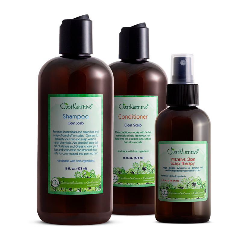 Three bottles of Just Nutritive hair care products on a white background