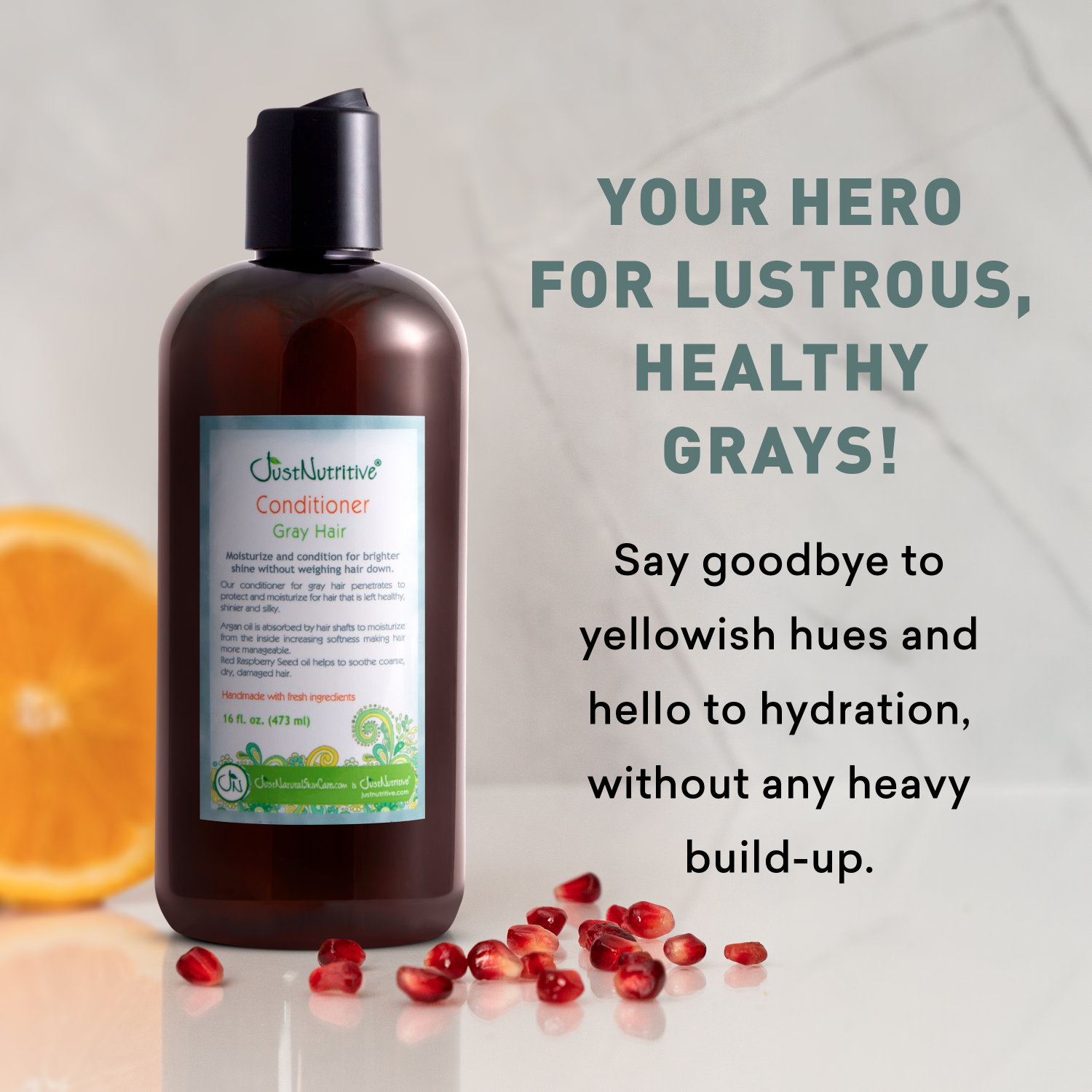 Bottle of conditioner with text about lustrous, healthy grays on a light background