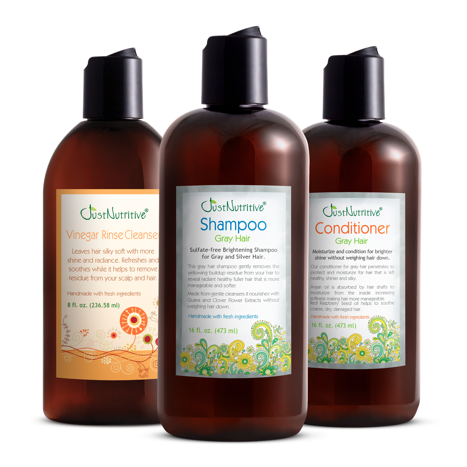 Three bottles of OshKosh hair care products on a white background