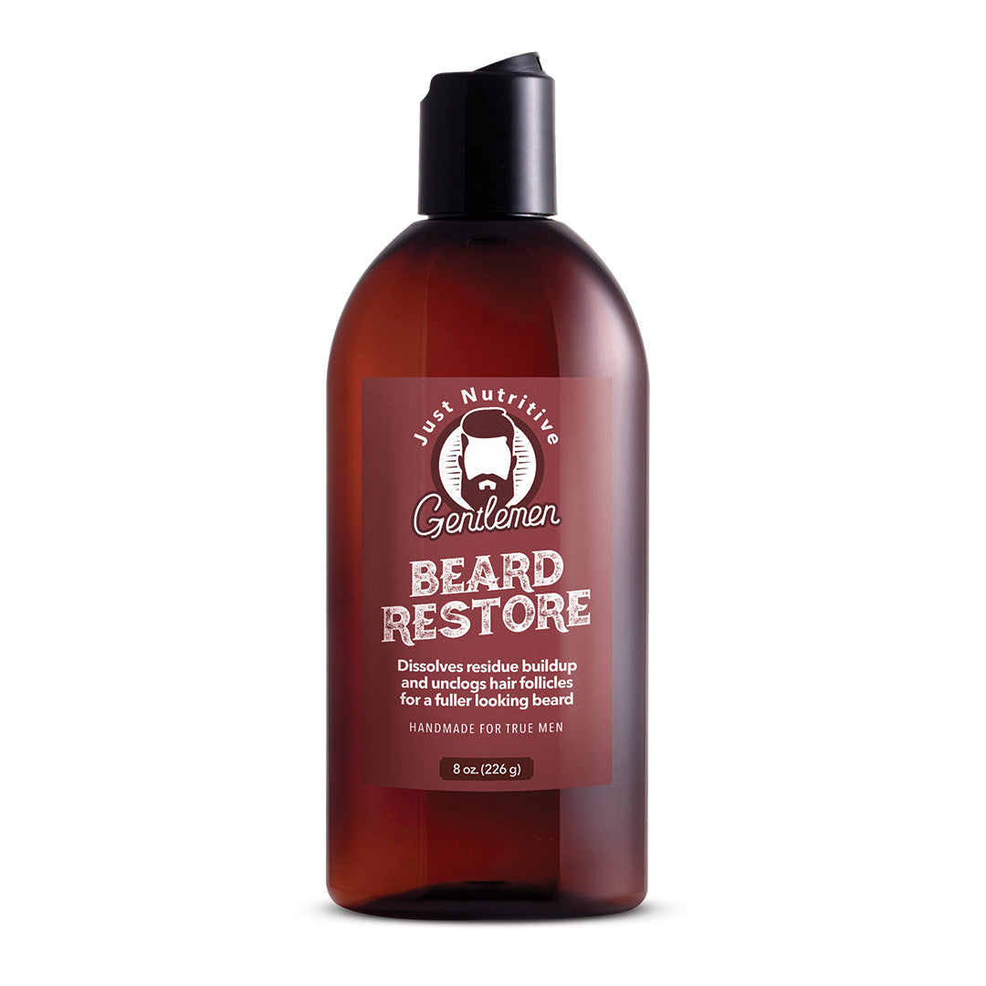 Brown bottle of 'Gentlemen Beard Restore' on a white background