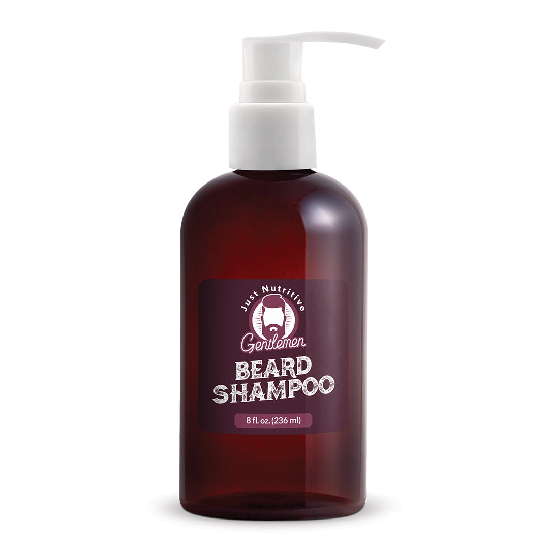 Brown bottle of beard shampoo with a white pump on a white background