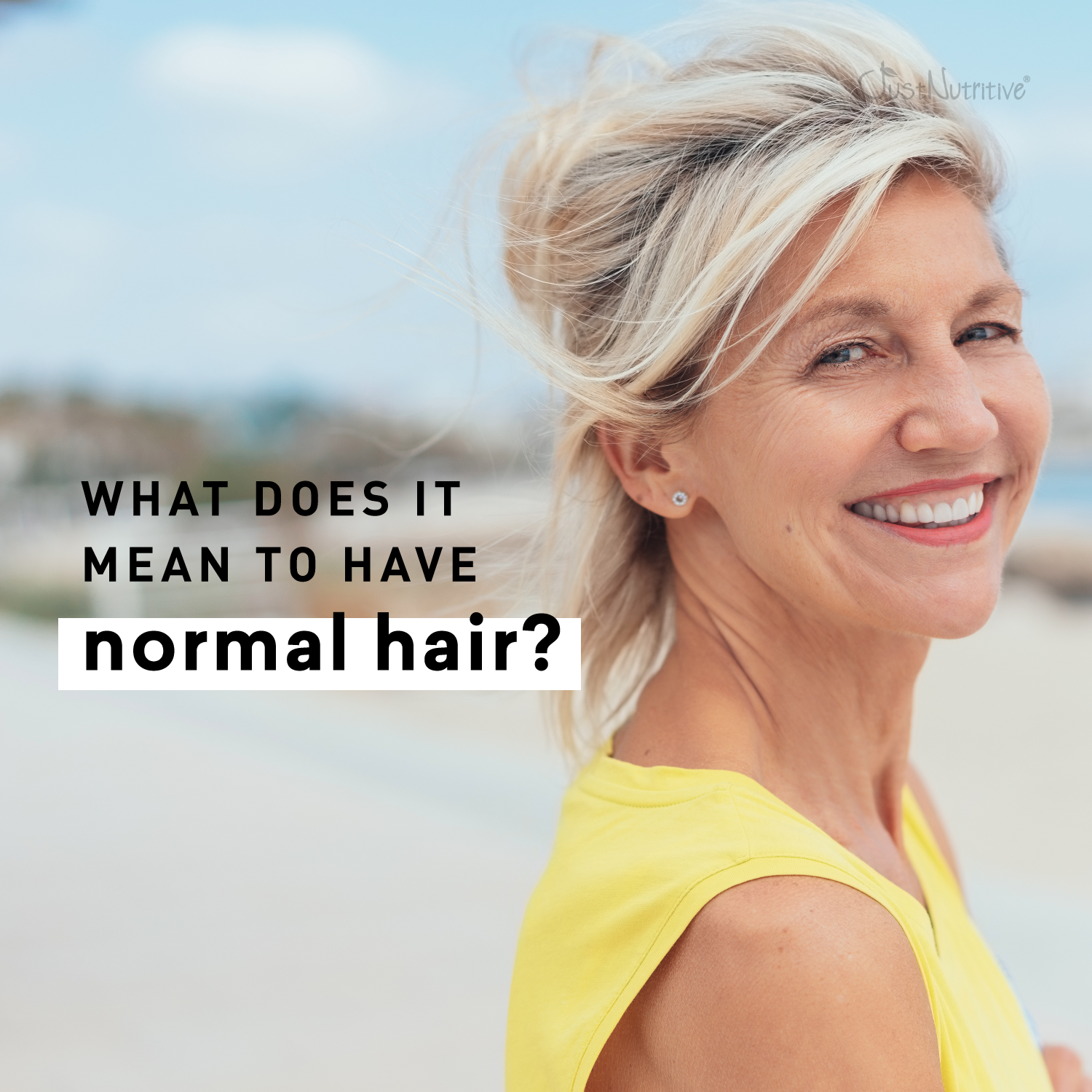 Woman with blonde hair smiling outdoors, text overlay 'What does it mean to have normal hair?'