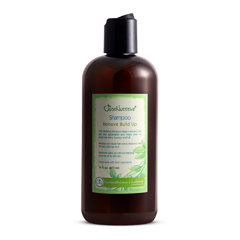 Brown shampoo bottle with a green label on a white background