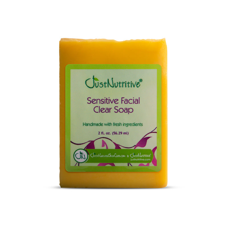 Yellow bar of soap with a green label on a white background