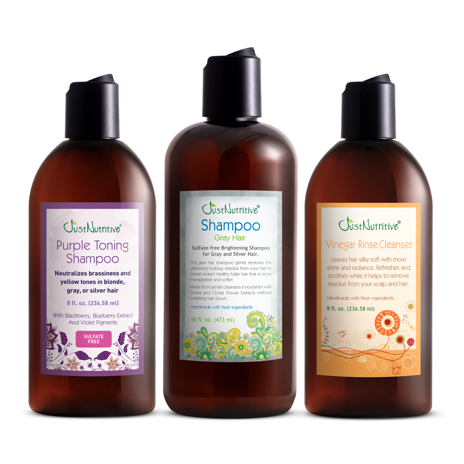 Three bottles of Just Nutritive hair care products on a white background